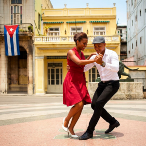 A couple is dancing Son in the streets of Havana.